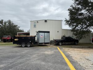 Removing damaged insulation, Jenna Pendley; Extraction Pros; house; insulation; fiberglass; energy efficiency; alabama; insulator; baldwin county; Gulf Shores